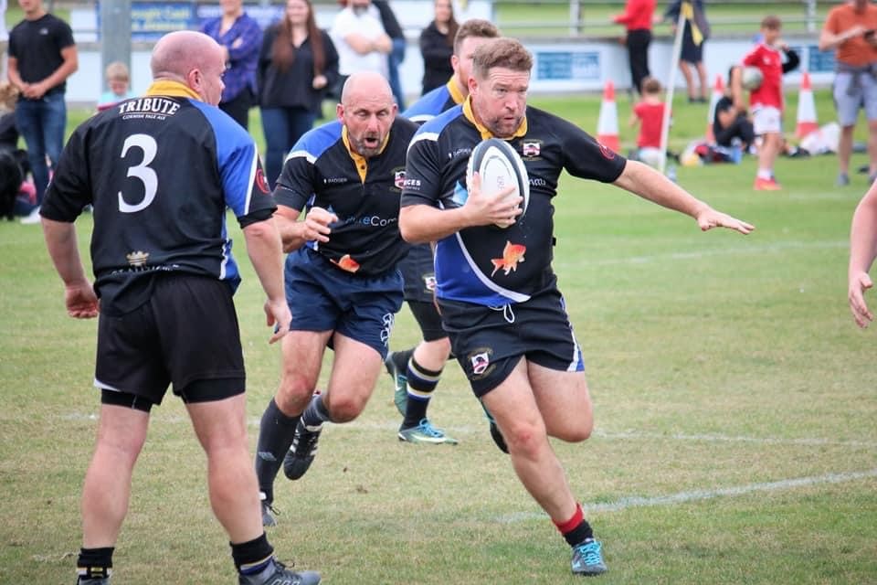 PureComms CEO, Rob Vivian, playing rugby for the local team